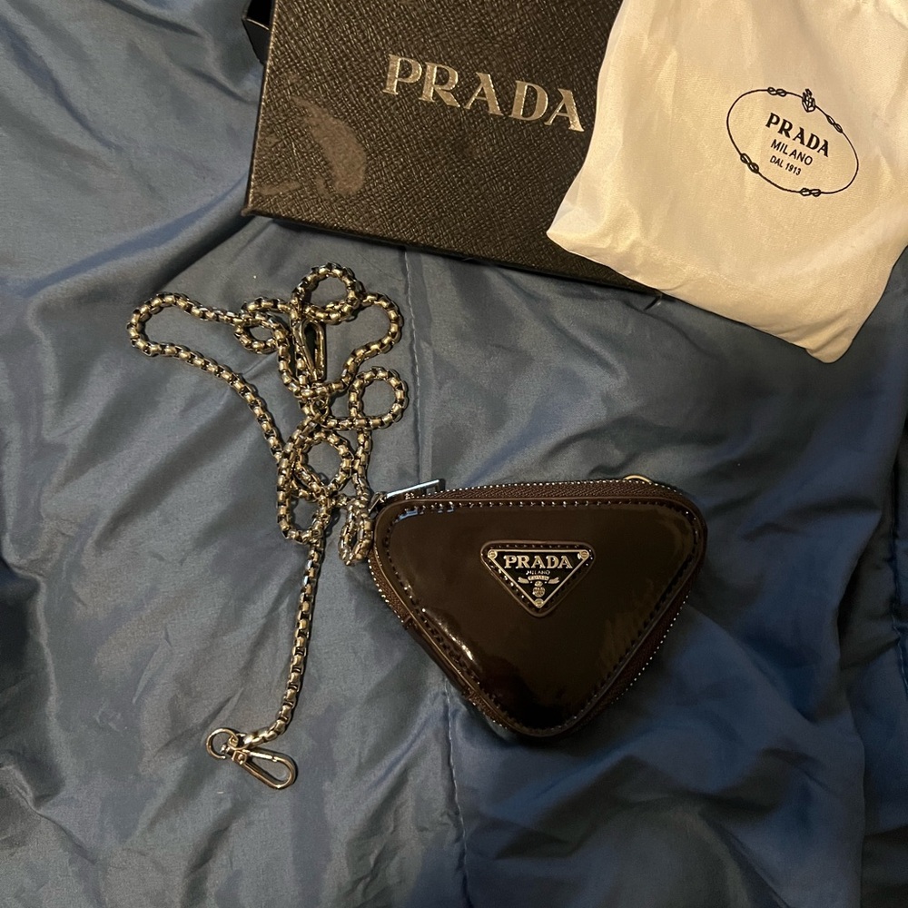 Prada triangle violet mini bag with crossbody sling